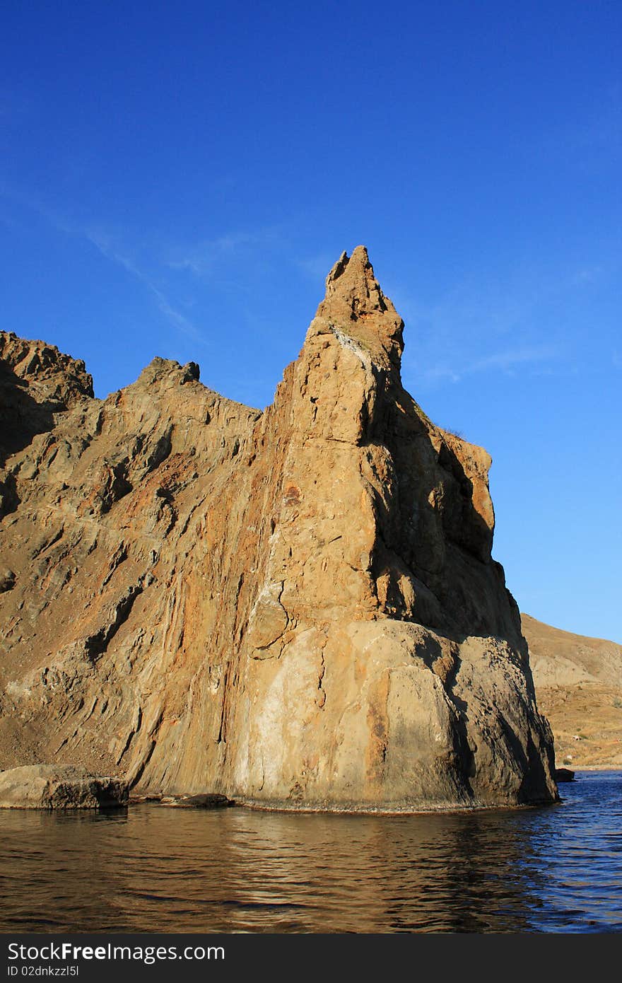 Rock In The Sea - Vertical Image