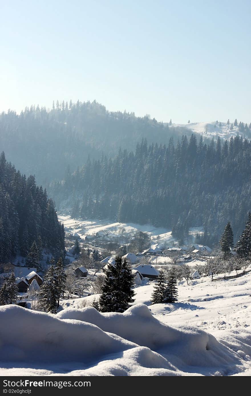 Small village in Transylvania covered in snow. Small village in Transylvania covered in snow