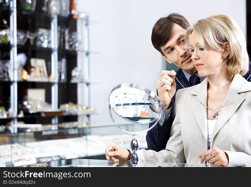 Couple in jeweller shop