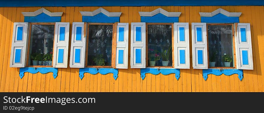 Part of rural house. Four windows.