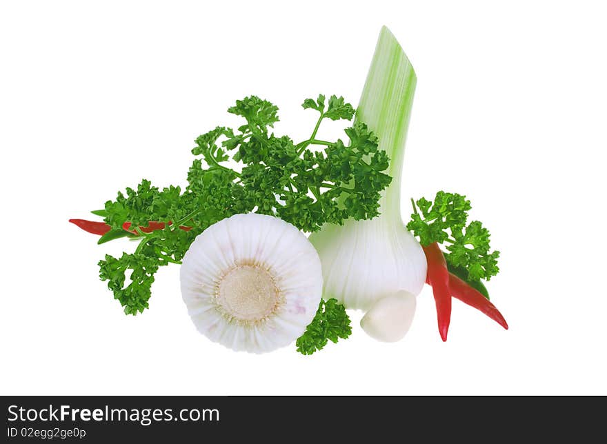 Fresh garlic, parsley and chilli peper isolated on white background