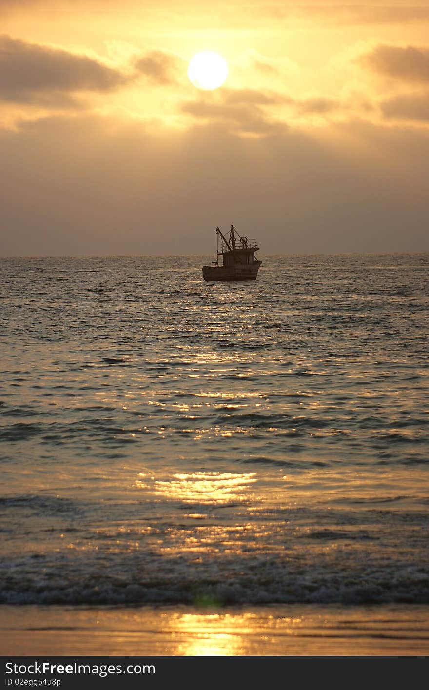 Boat At Sunset