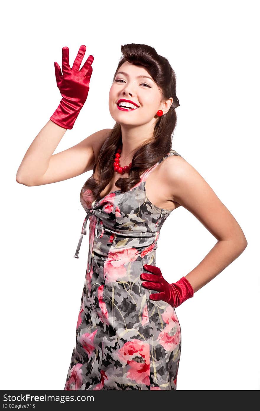 Pin-up girl with red gloves studio shot