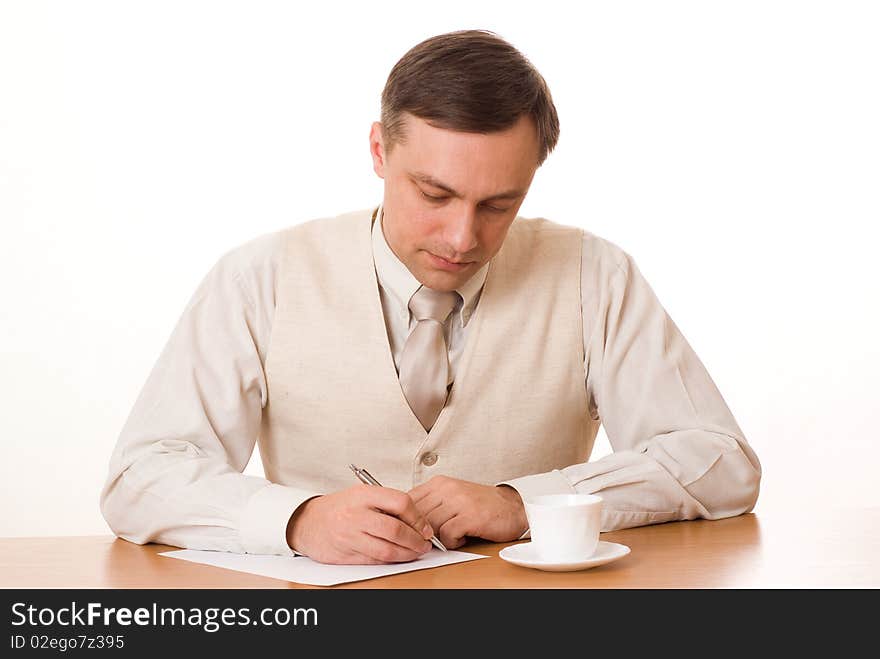 Handsome businessman, wrote a table on a white background. Handsome businessman, wrote a table on a white background