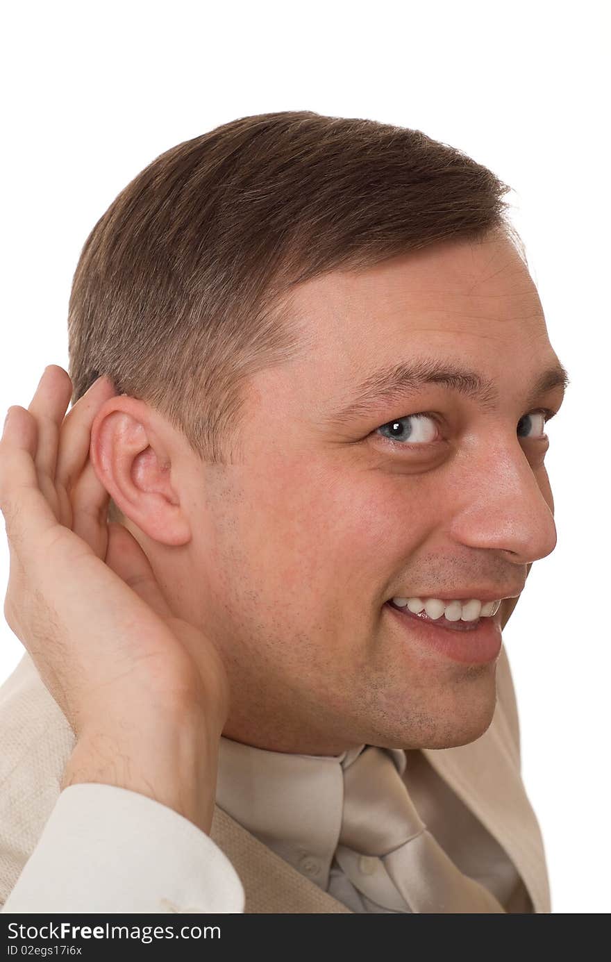 Young businessman standing and listens