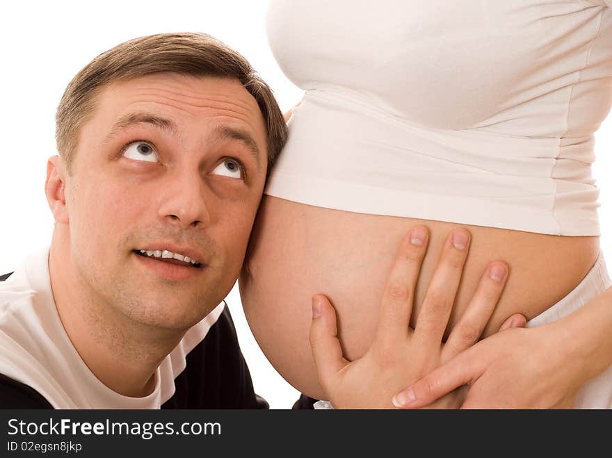 Man with his pregnant wife together on a white background. Man with his pregnant wife together on a white background