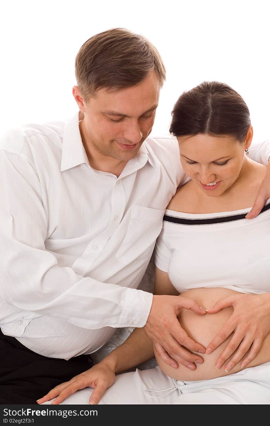 Happy man with his wife were sitting on a white background