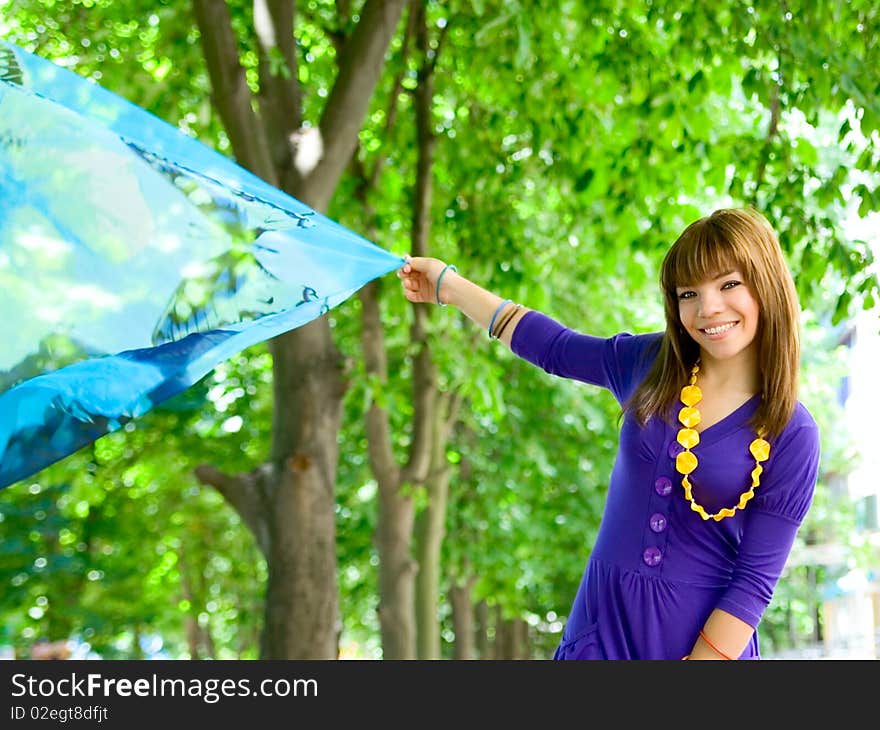 Portrait young girl in blue outdoor