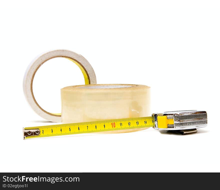 Scotch tape and tape-measure isolated on white