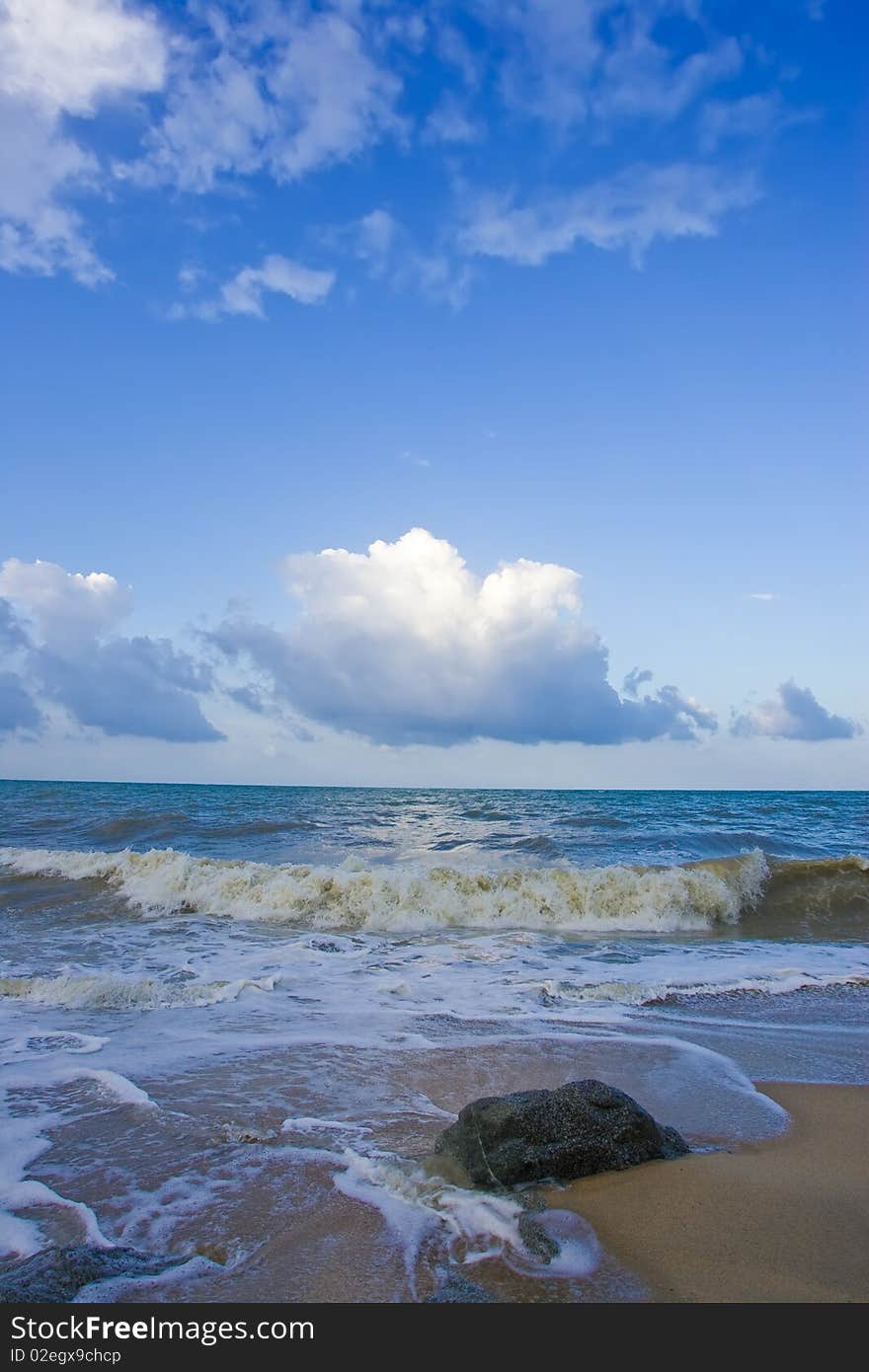 Wave surging on sand on beach and beautiful cloud. Wave surging on sand on beach and beautiful cloud