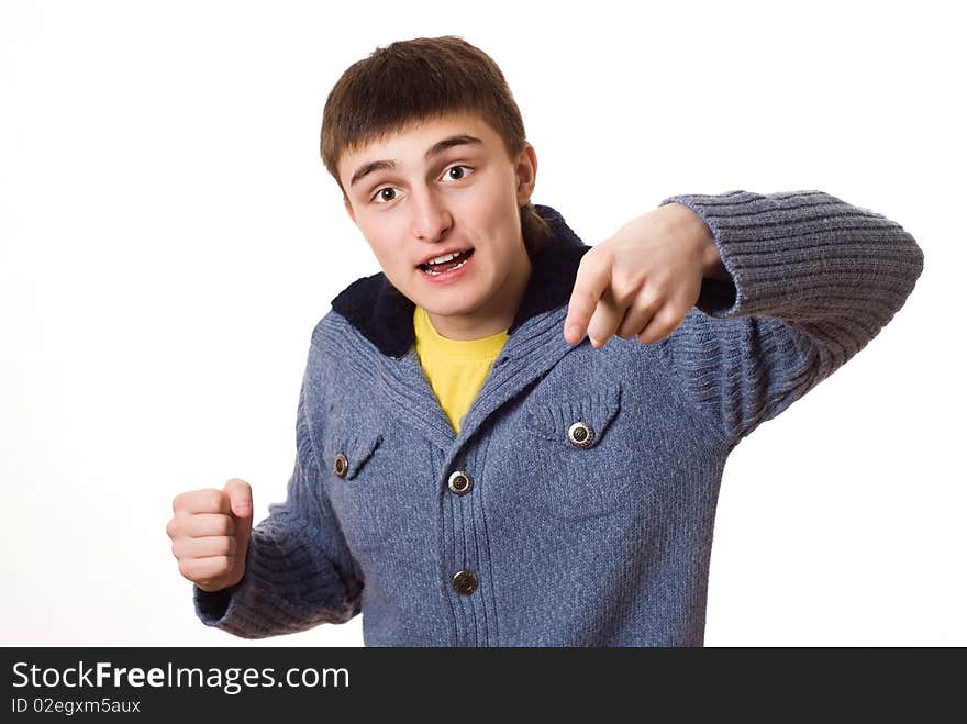 Beautiful teenager is angry at white background