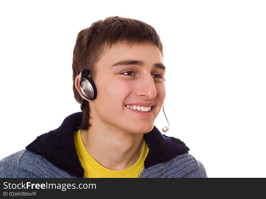 Teenager with headphones on white