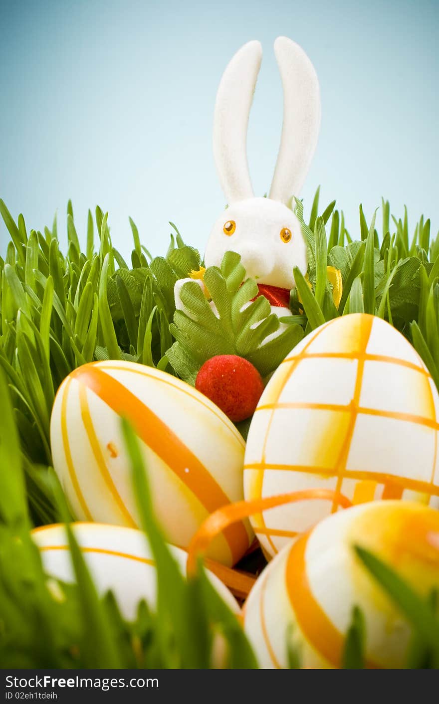 Easter eggs and bunny in grass