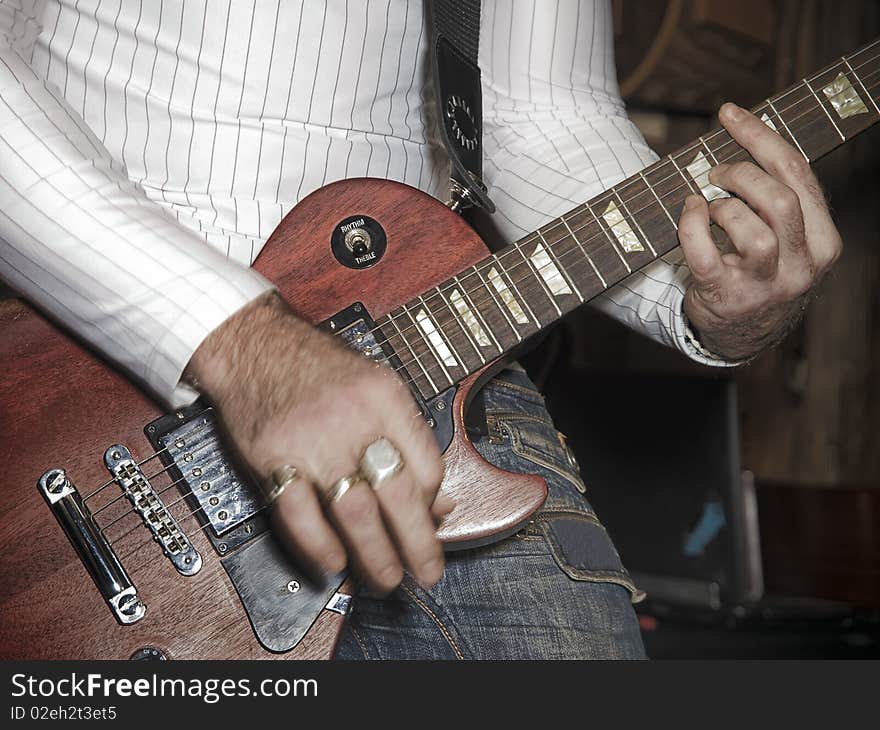 Man playing electrical guitar