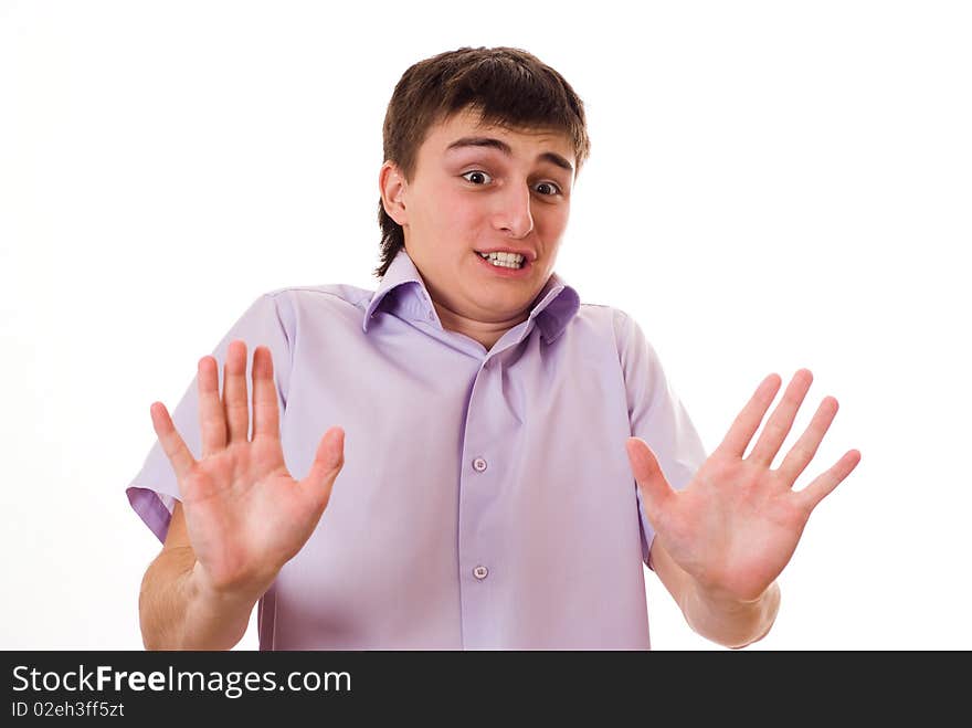 Teenager Standing Against A White Background