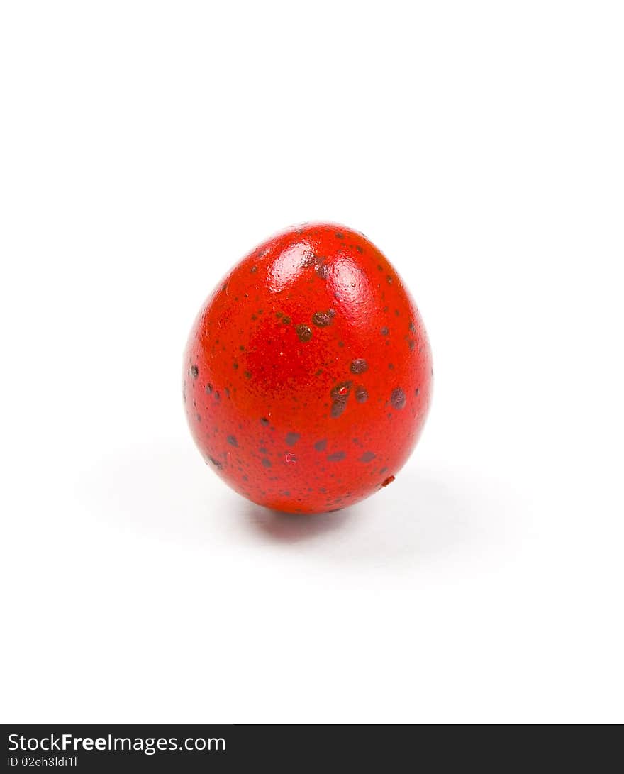 One red easter egg on white background