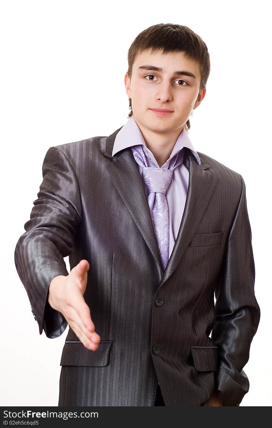 Handsome businessman standing on white background