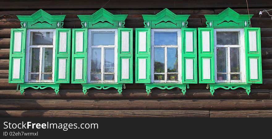 Part of rural house. Four windows.