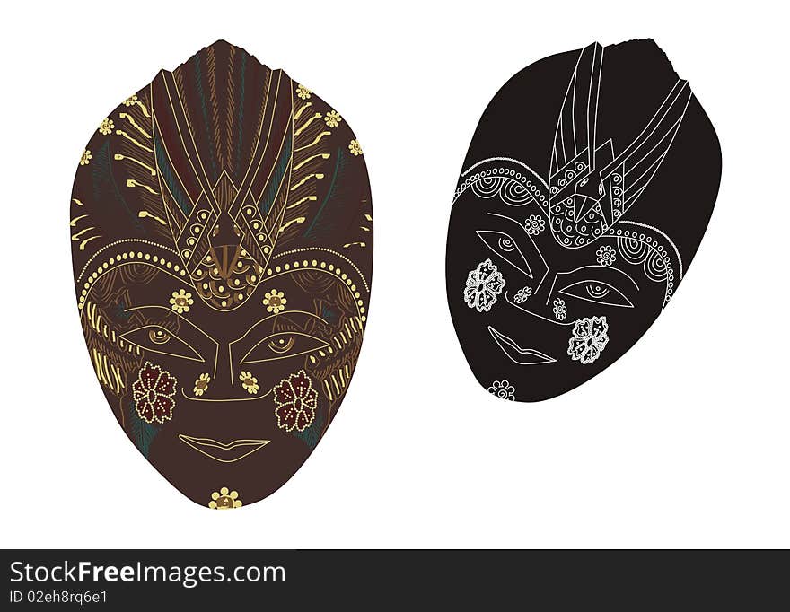 Two traditional masks, one with simple lines and the other with painted sculptured lines.