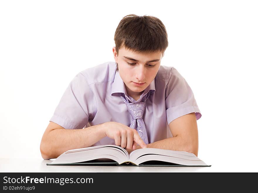 Portrait of a handsome businessman in a purple shirt with a book on white background