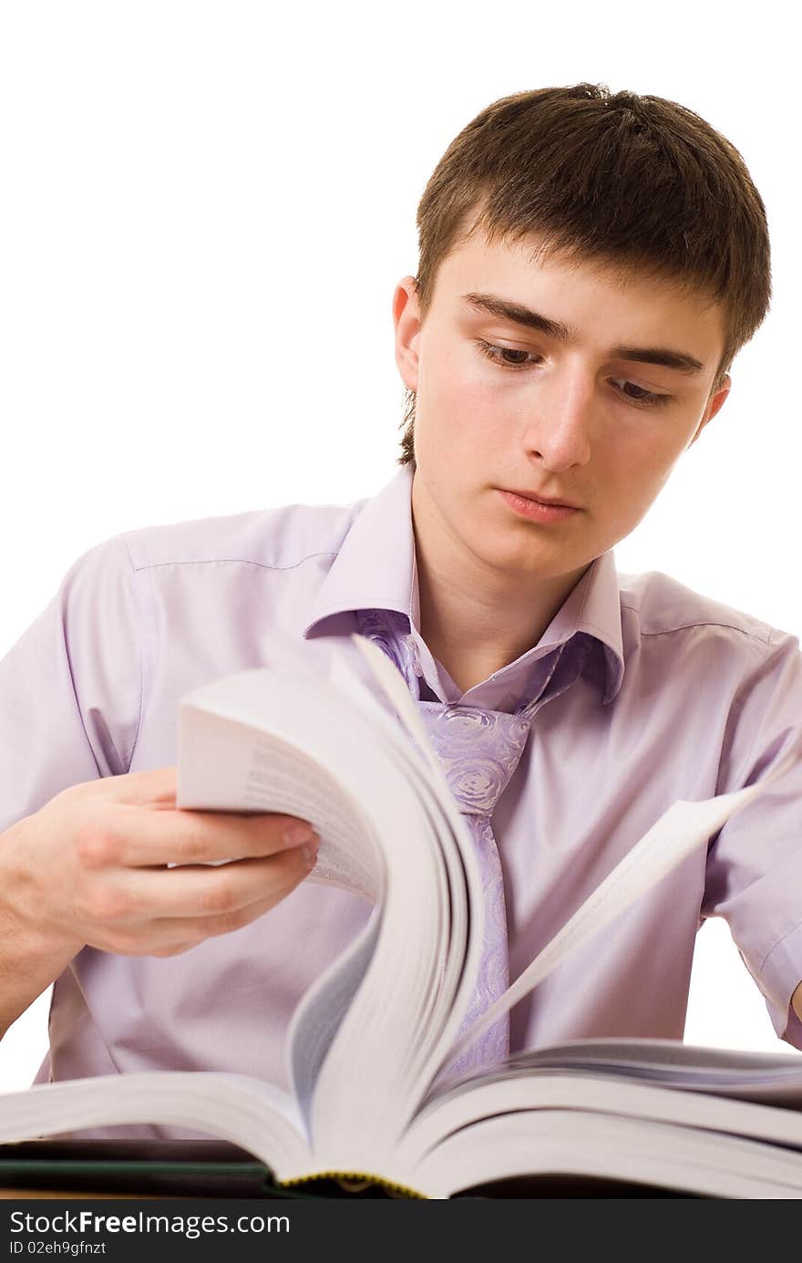 Businessman in a purple shirt with a book on white background