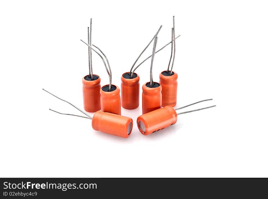 Electronic capacitors against on a white background