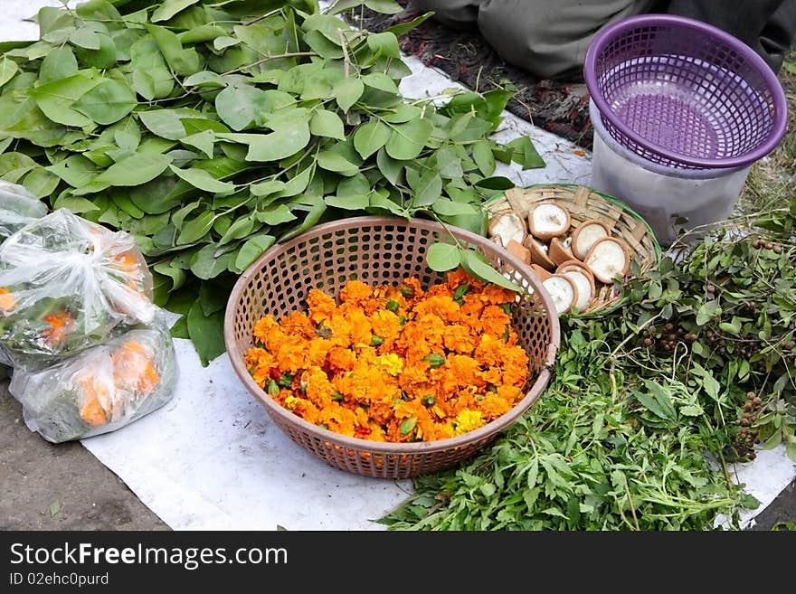 Making flower decoration for hindu temple