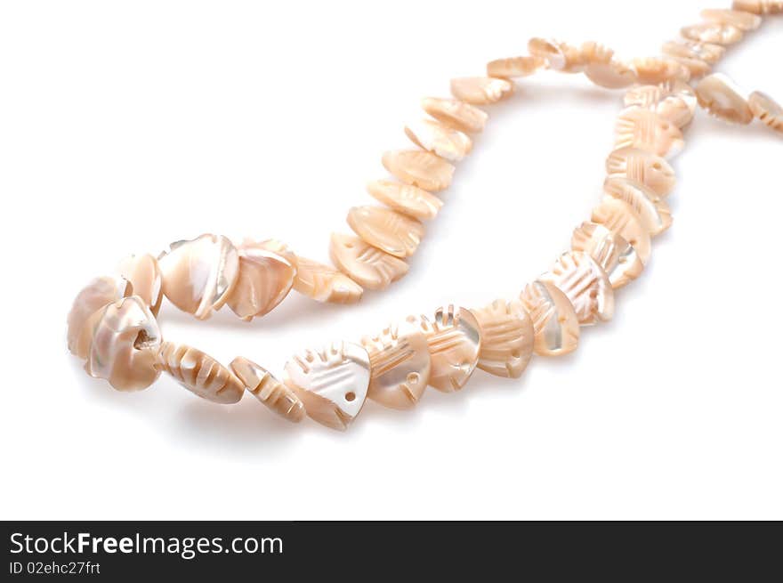 Necklace is made of sea shell in the form of fish