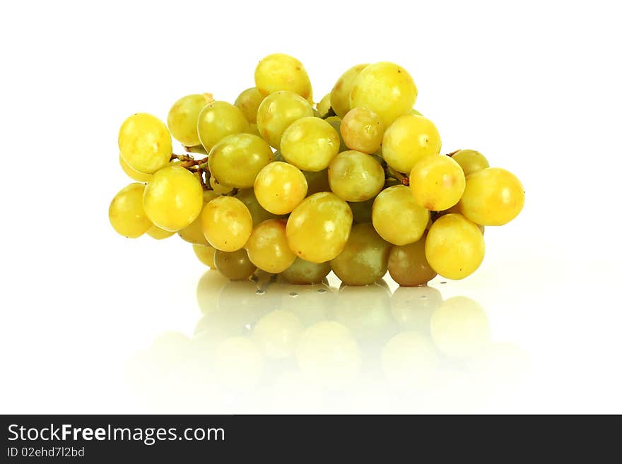 Green grape isolated and reflected on white