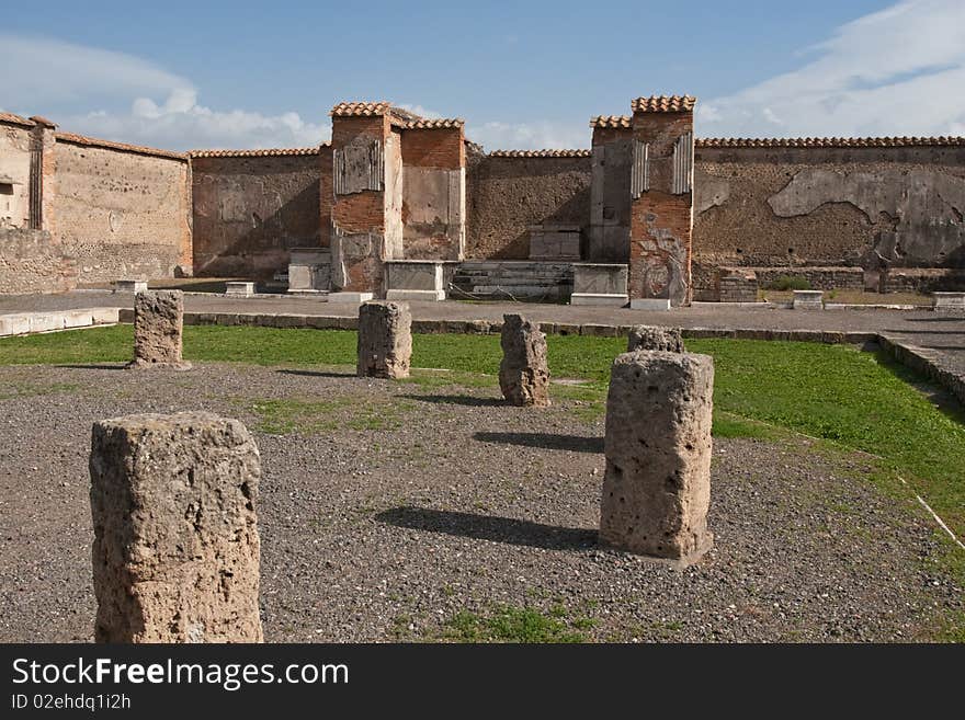 A photo of a portion of the ruins at the ancient city of Pompeii. The city was destroyed by the eruption of the volcano, Mount Vesuvius in 79 AD. A photo of a portion of the ruins at the ancient city of Pompeii. The city was destroyed by the eruption of the volcano, Mount Vesuvius in 79 AD