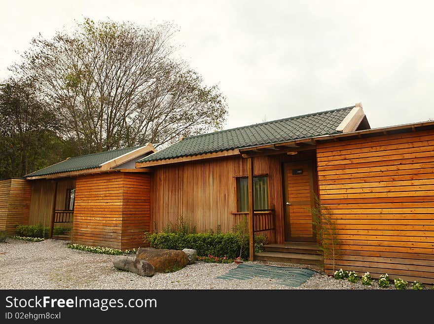 Wooden country house on the country side.