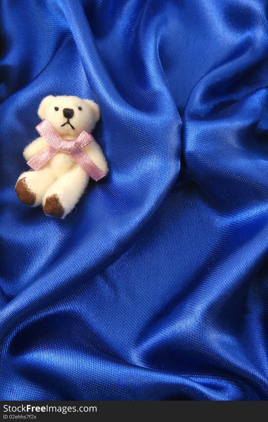 Blue silk with a bear. Blue silk with a bear