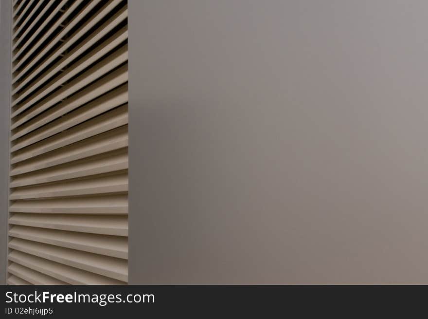 Detail of a modern  building with beige blinds can be used as a background