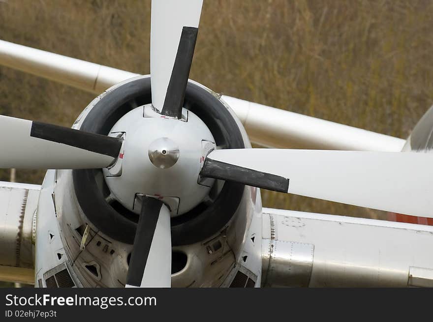 Engine and propeller close-up of a vintage airplane. Engine and propeller close-up of a vintage airplane