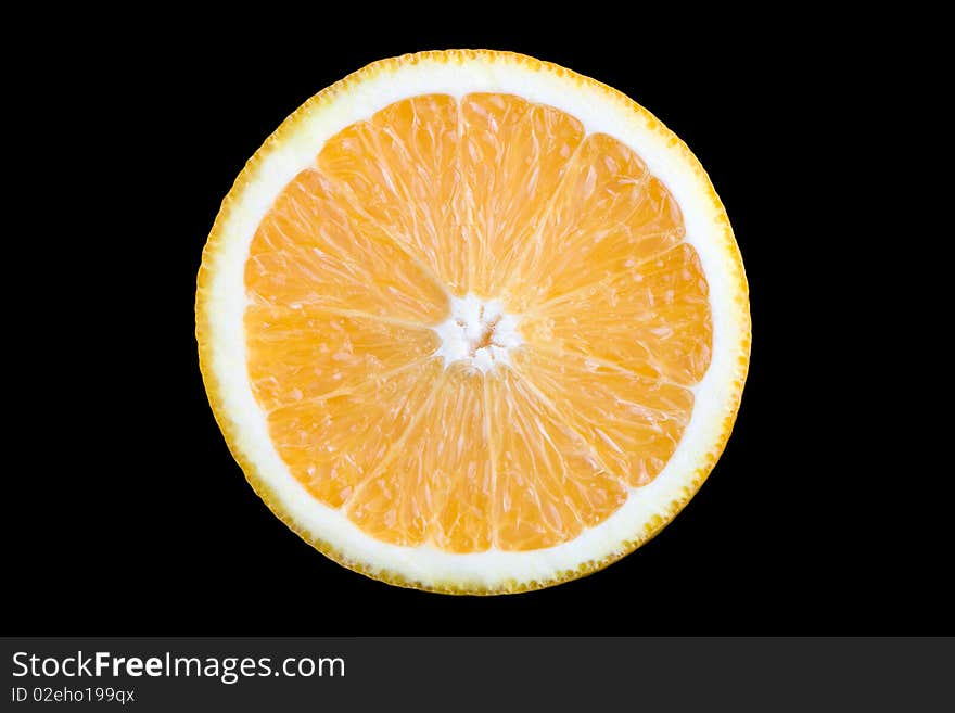 Fresh juicy orange isolated over black background