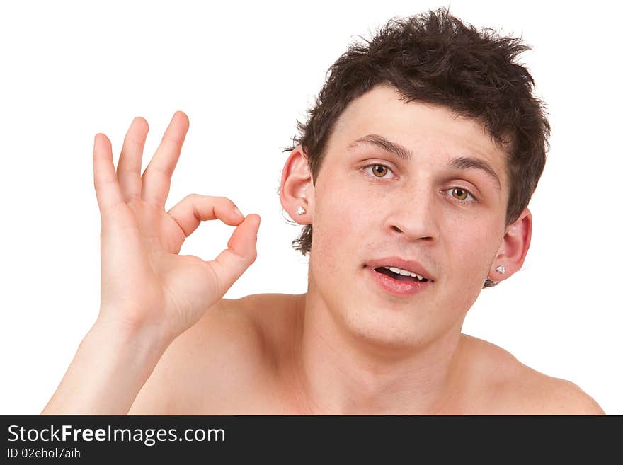 Handsome young man showing ok gesture isolated portrait