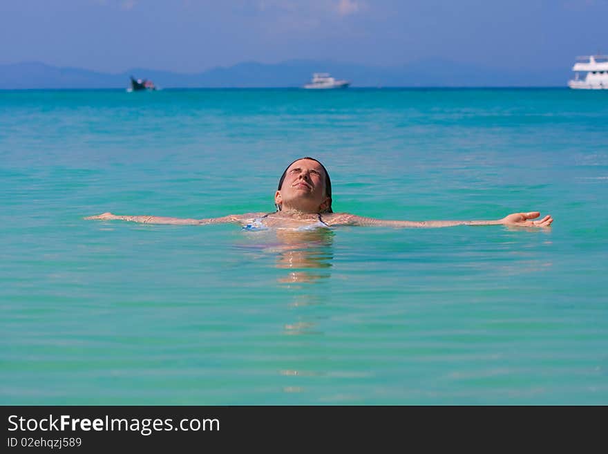 Girl with long hair playing in the sea. Girl with long hair playing in the sea