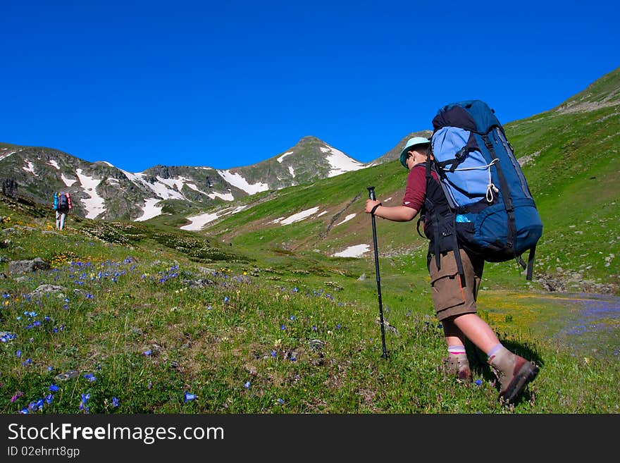 Happy hiker in Caucasus mountains