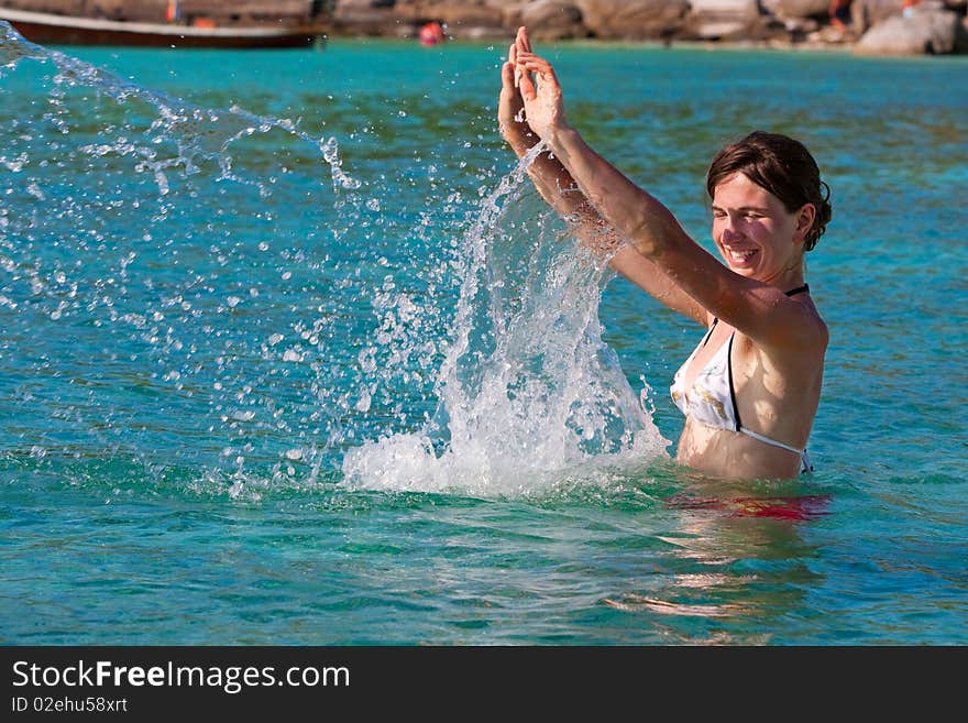 Girl with long hair playing in the sea. Girl with long hair playing in the sea