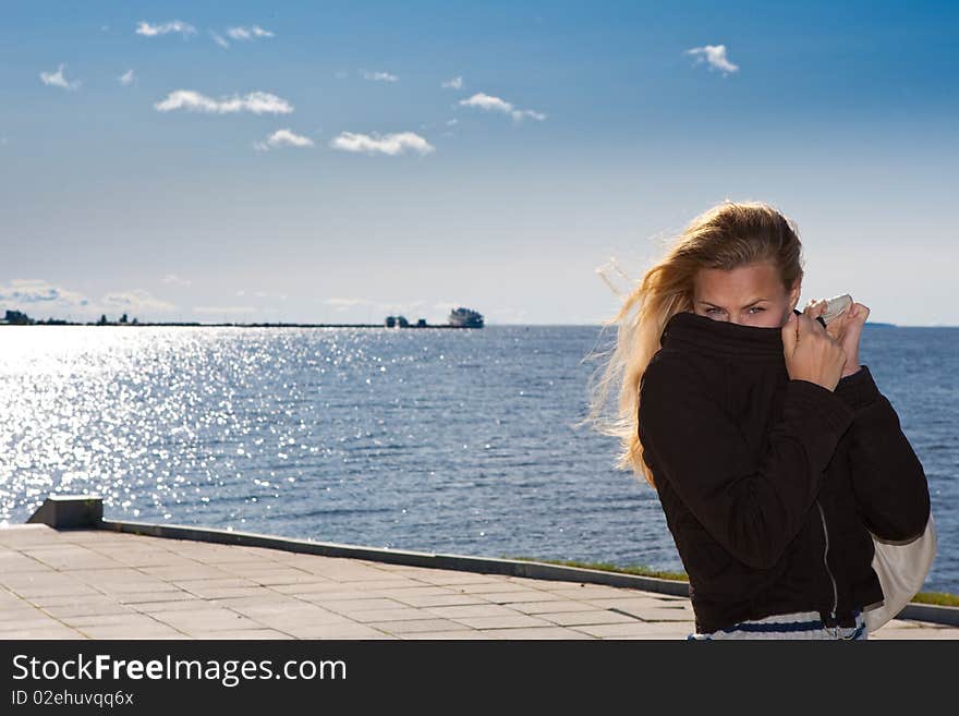 Young Women On Shore Lake