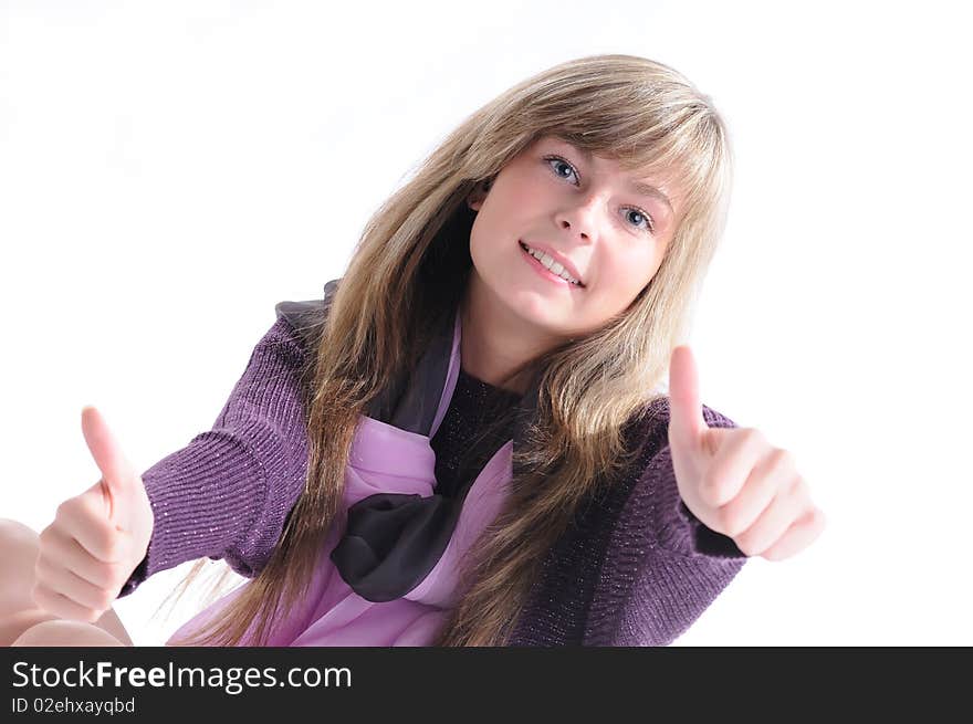 The young beautiful girl with a fair hair in a grey dress separately on a white background