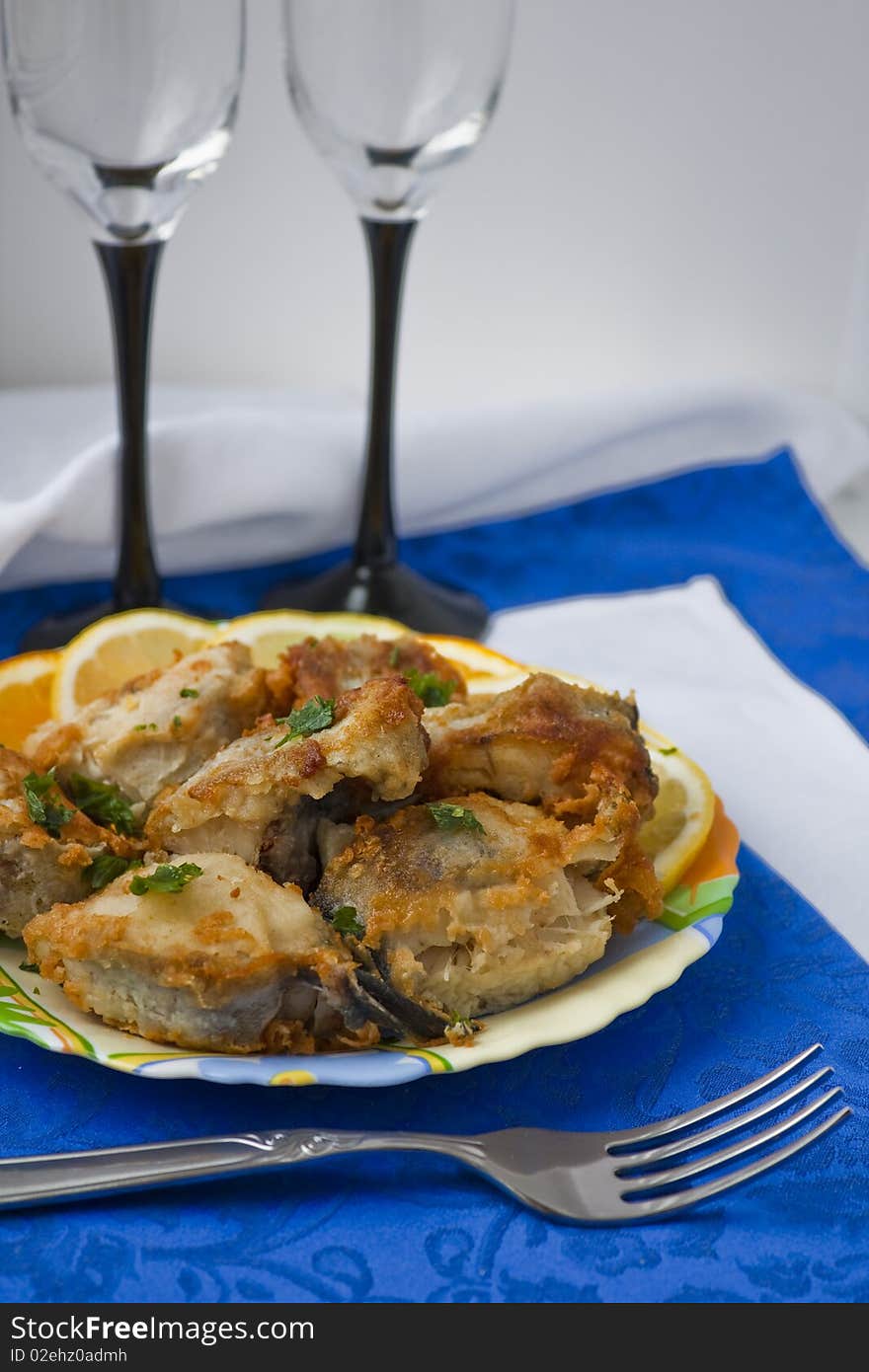 The Plate With Pieces Of The Fried Fish