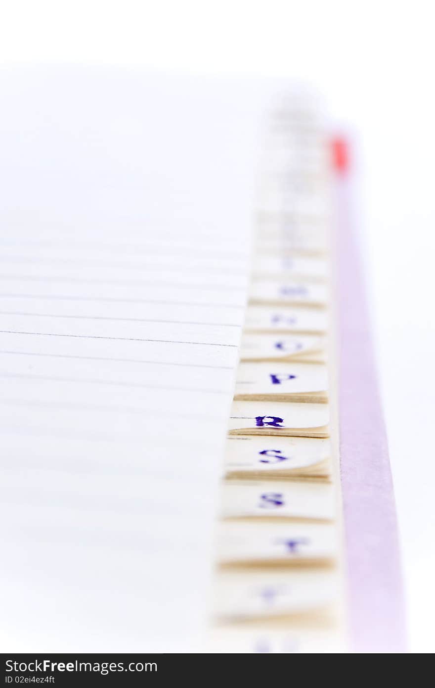 Closeup of a blank phone book; focused on letter R. Closeup of a blank phone book; focused on letter R