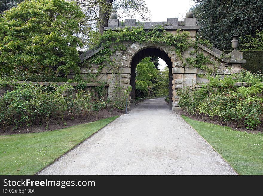 Old stone gates at the park entrance. Old stone gates at the park entrance