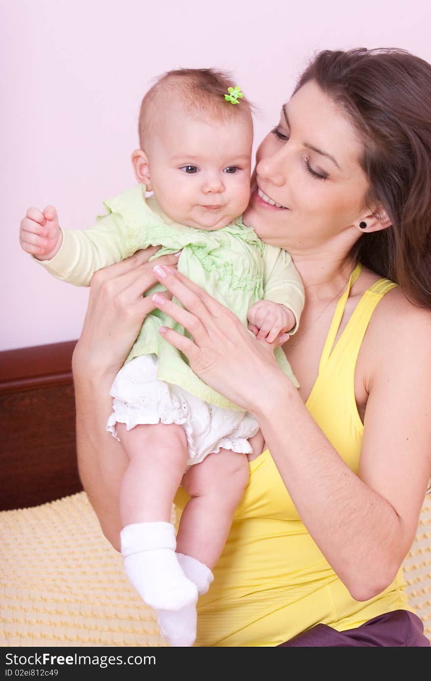 Mother's and daughter at home. Mother's and daughter at home