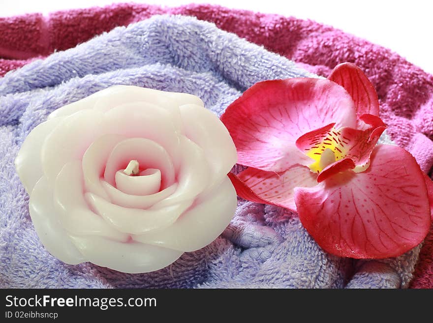 A spa items composition with flower and candle.