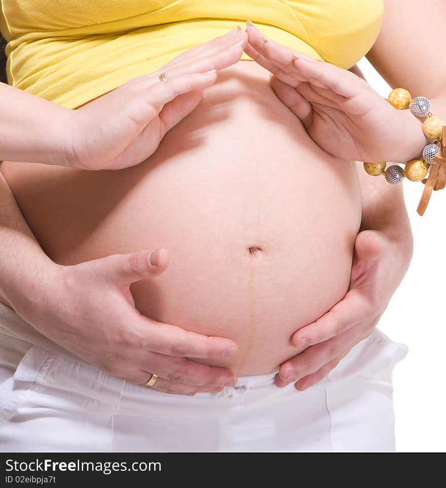 Pregnant and husband making house gesture