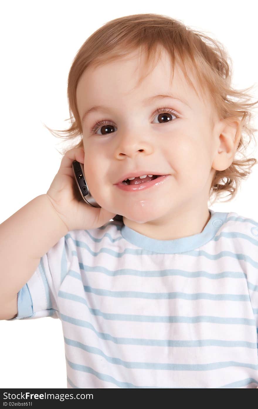 Little boy talking on the phone. Isolated on white background