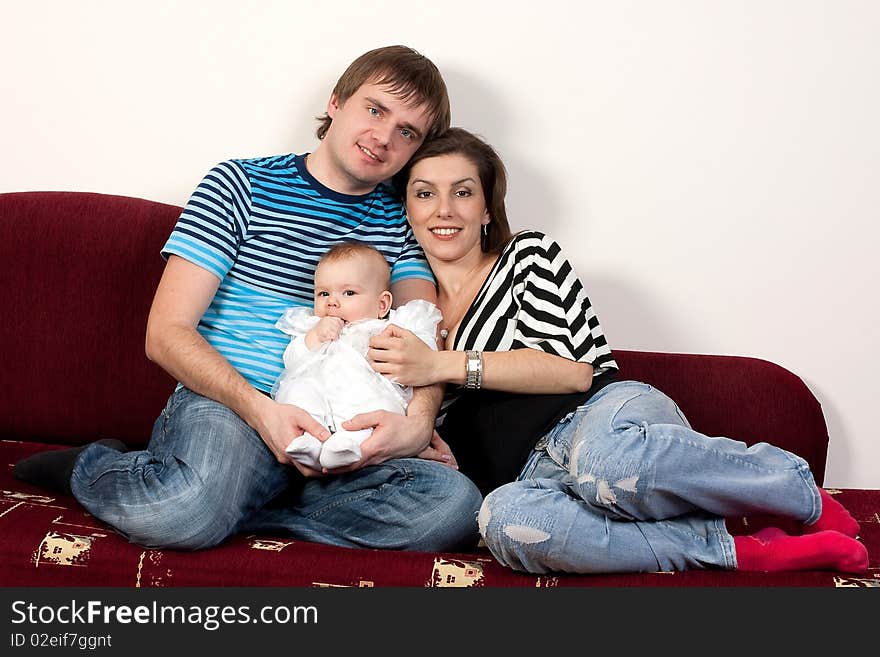 Family happy sitting on the sofa. Family happy sitting on the sofa