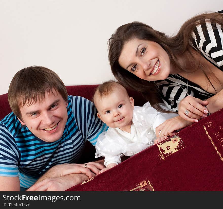 Family happy sitting on the sofa. Family happy sitting on the sofa